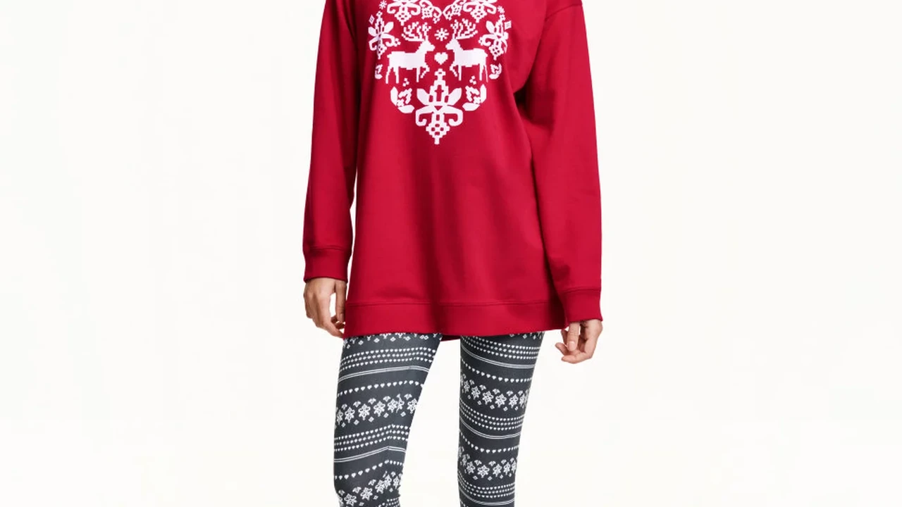 Close up on a plate of mashed potatoes, topped with baked pork chops with cream of mushroom soup, and a side of green beans.