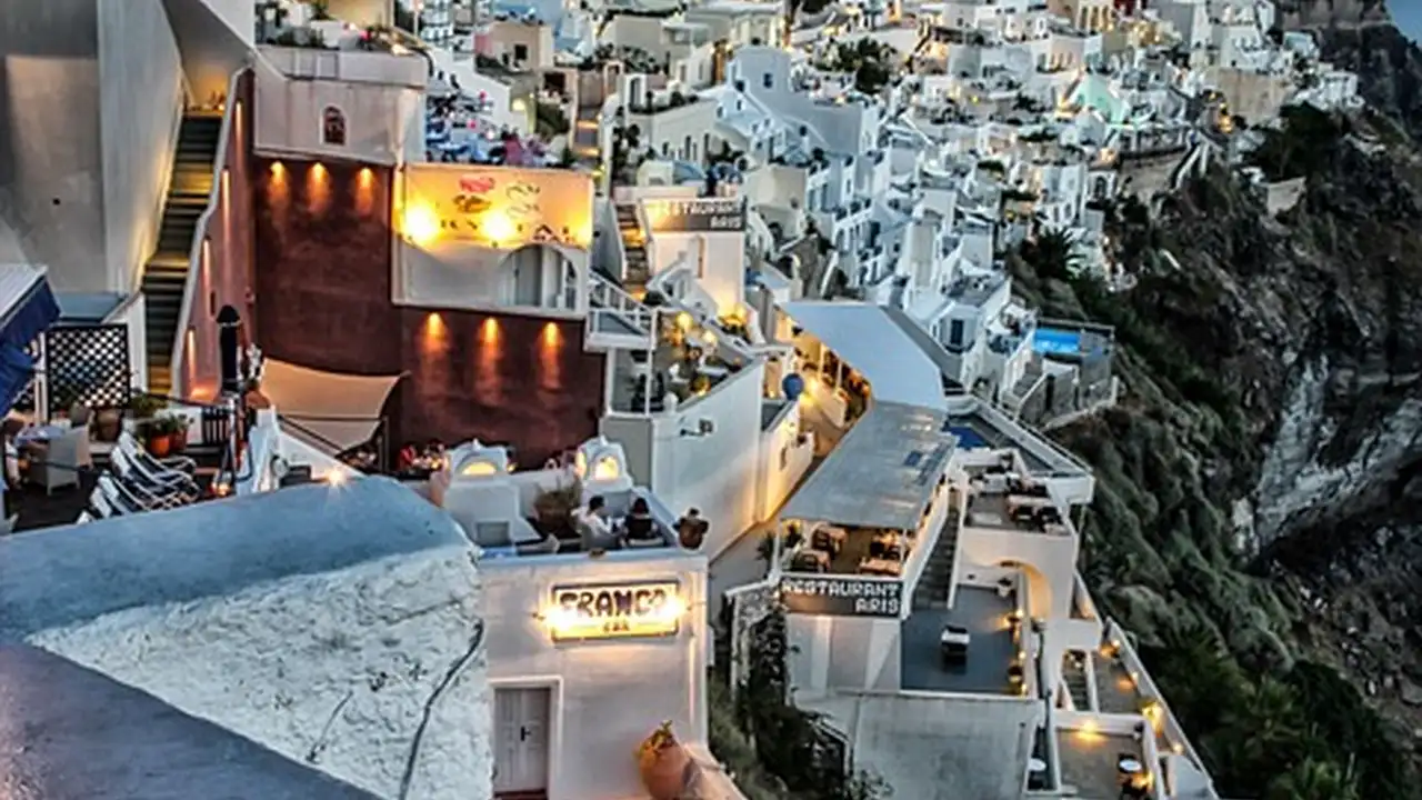 overhead view of corned beef sliced and on a platter with cabbage, potatoes, and carrots
